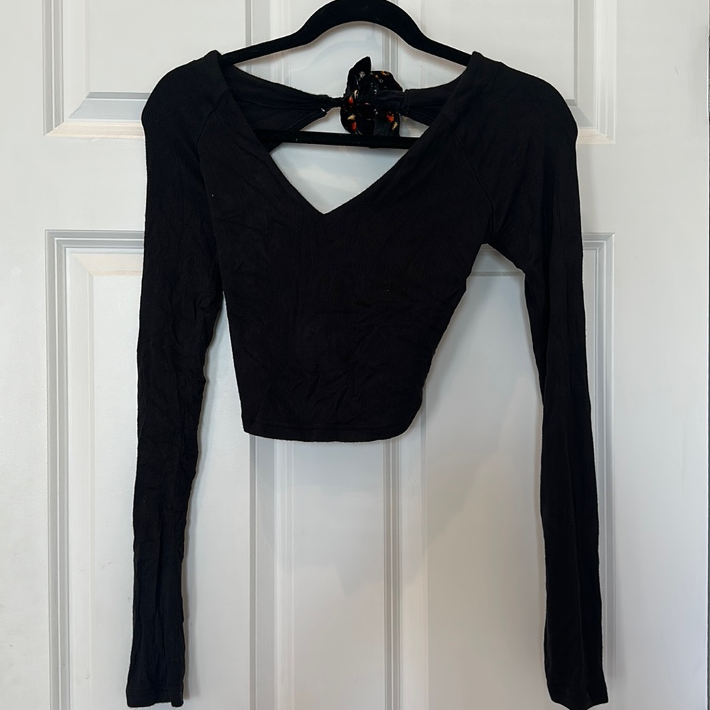 Black open back crop top with Ties. Never worn